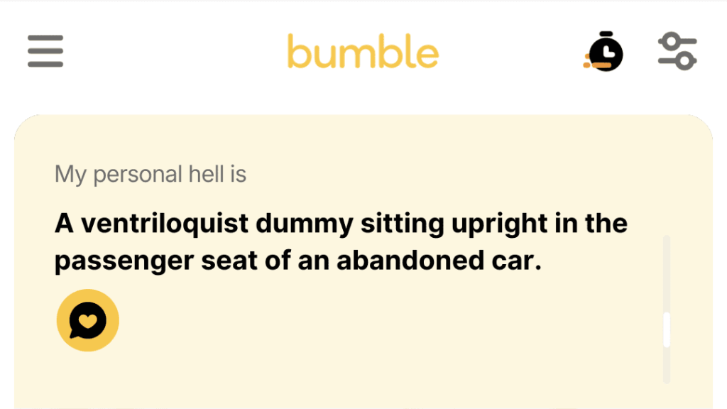 2. A ventriloquist dummy sitting upright in the passenger seat of an abandoned car.